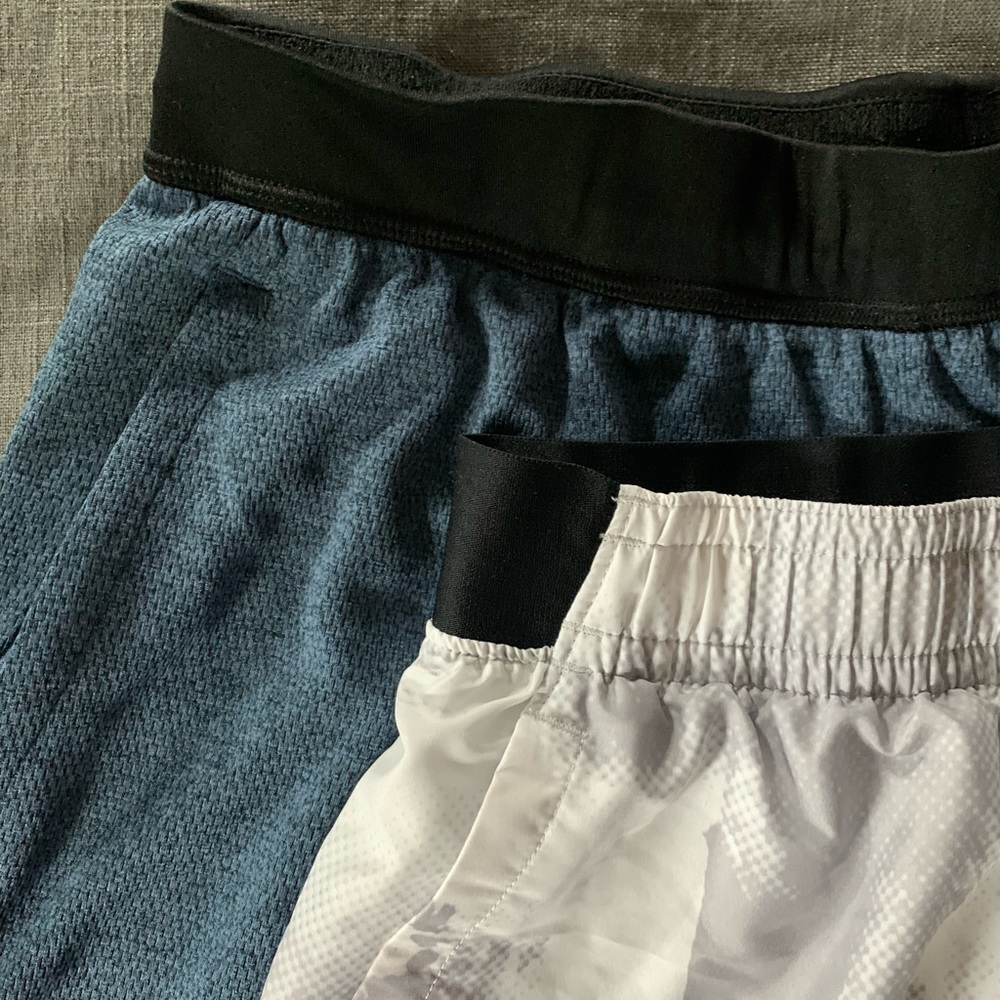 2 pairs of men’s med shorts.White/gray camo- Under Armour,Heather blue- adidas.